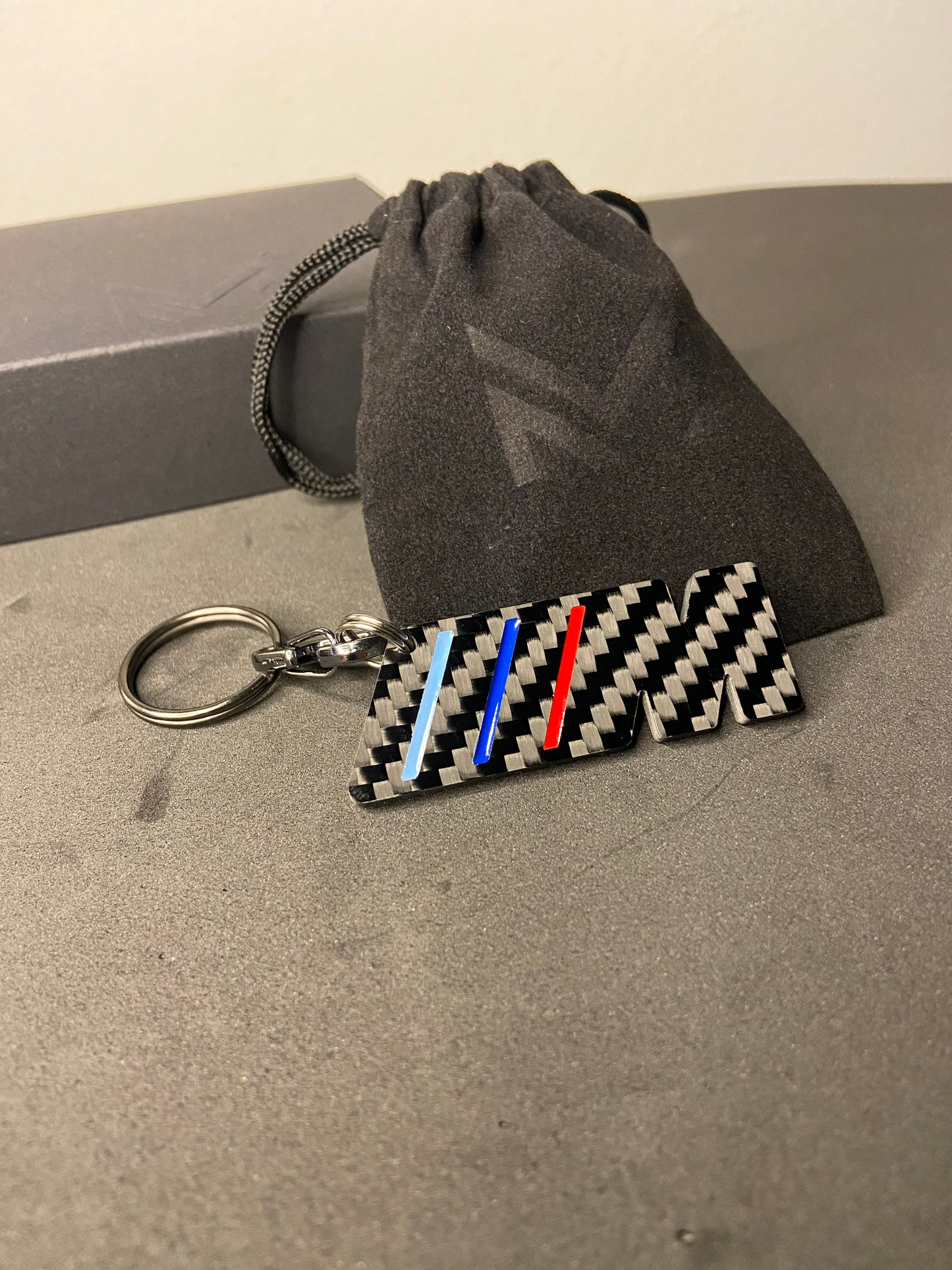 M keychain