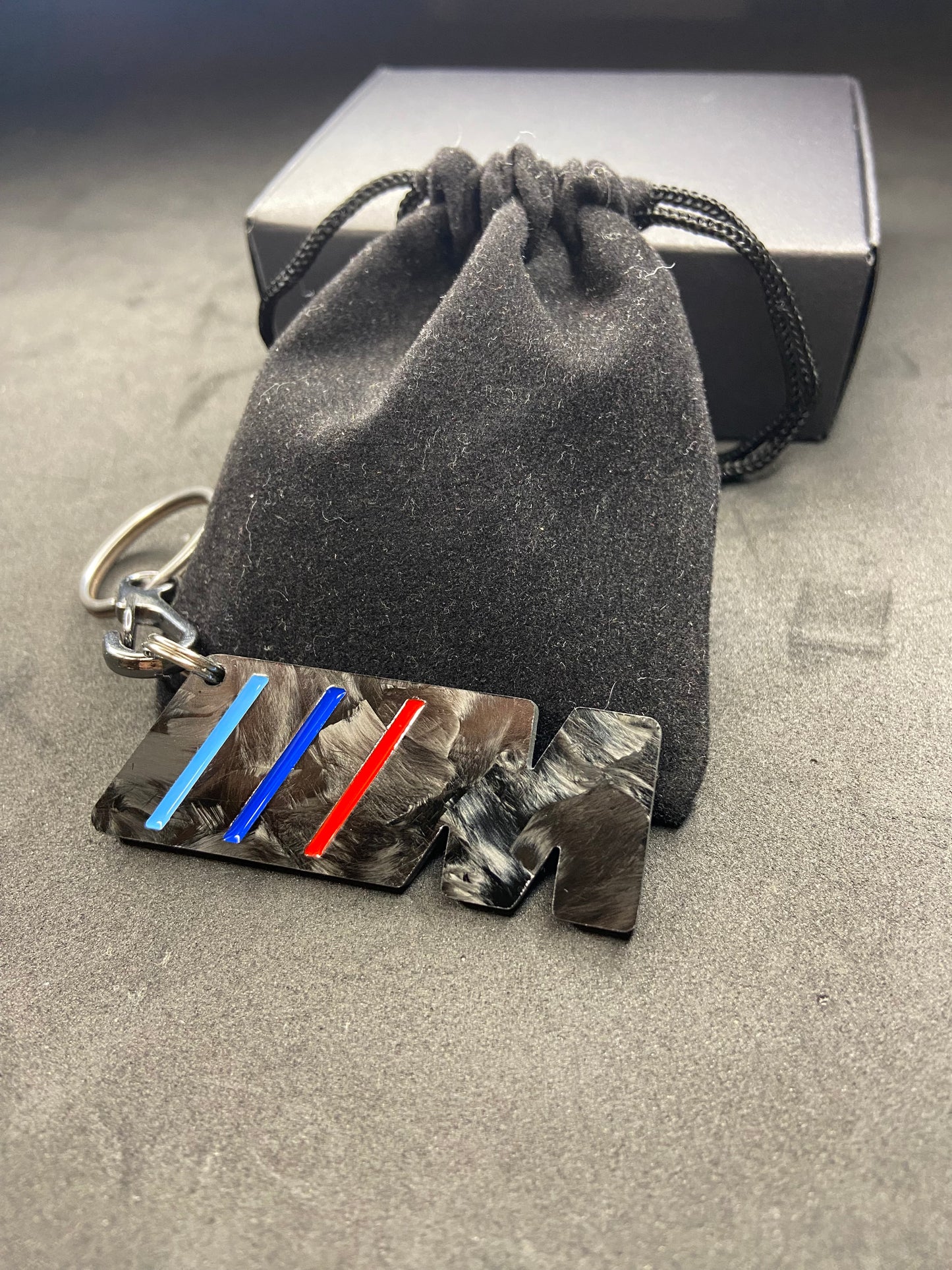 M keychain