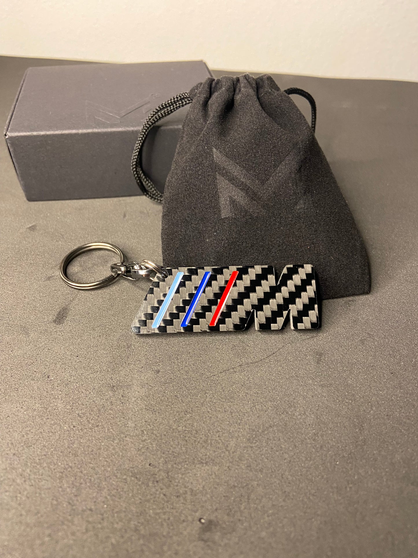 M keychain