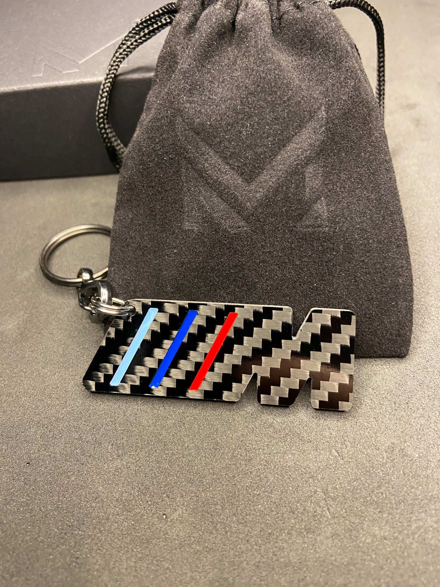 M keychain