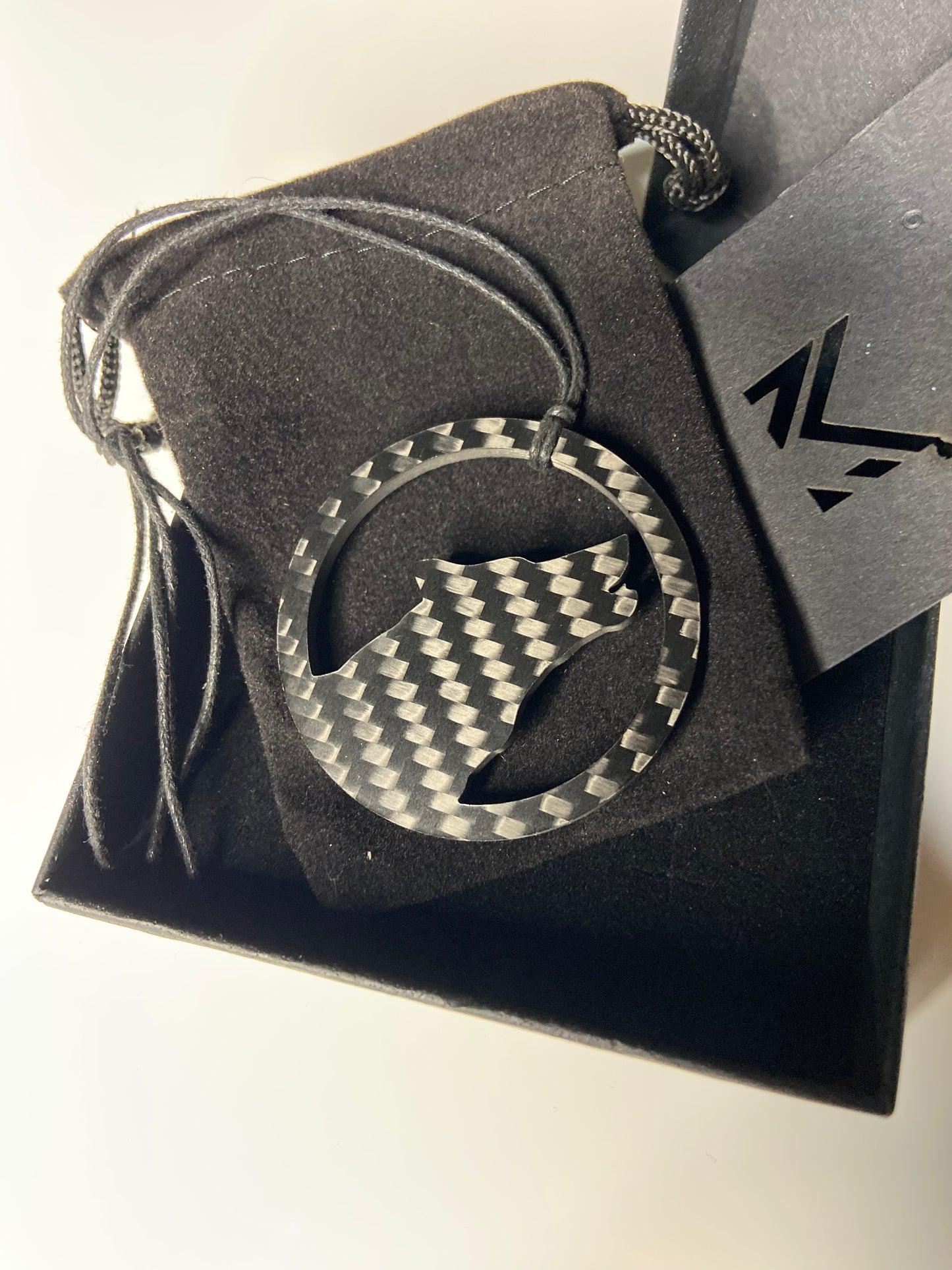Moon pendant with wolf