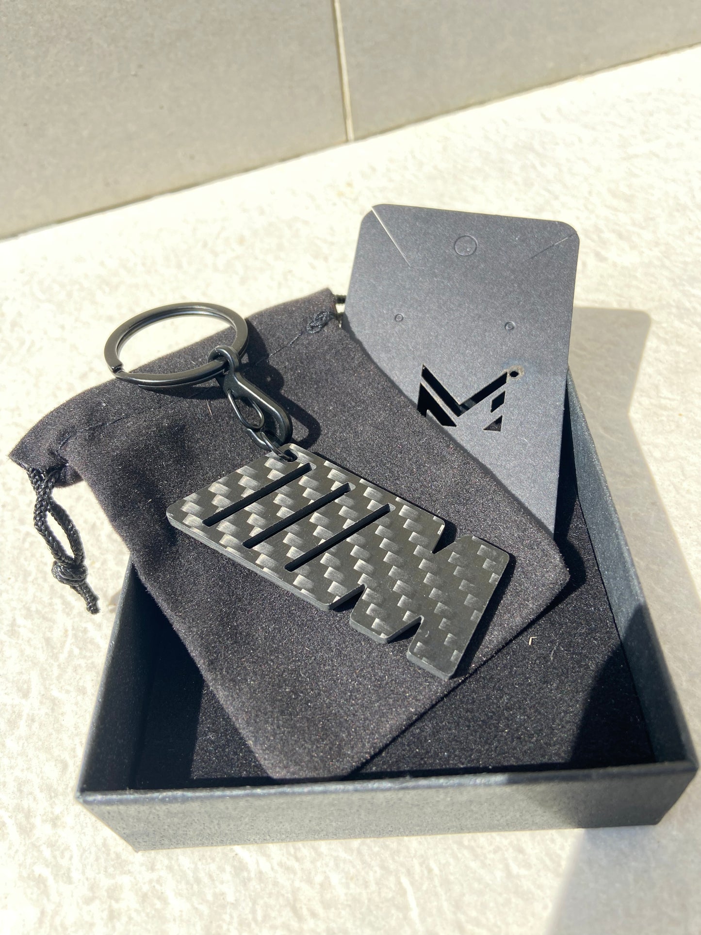 M keychain