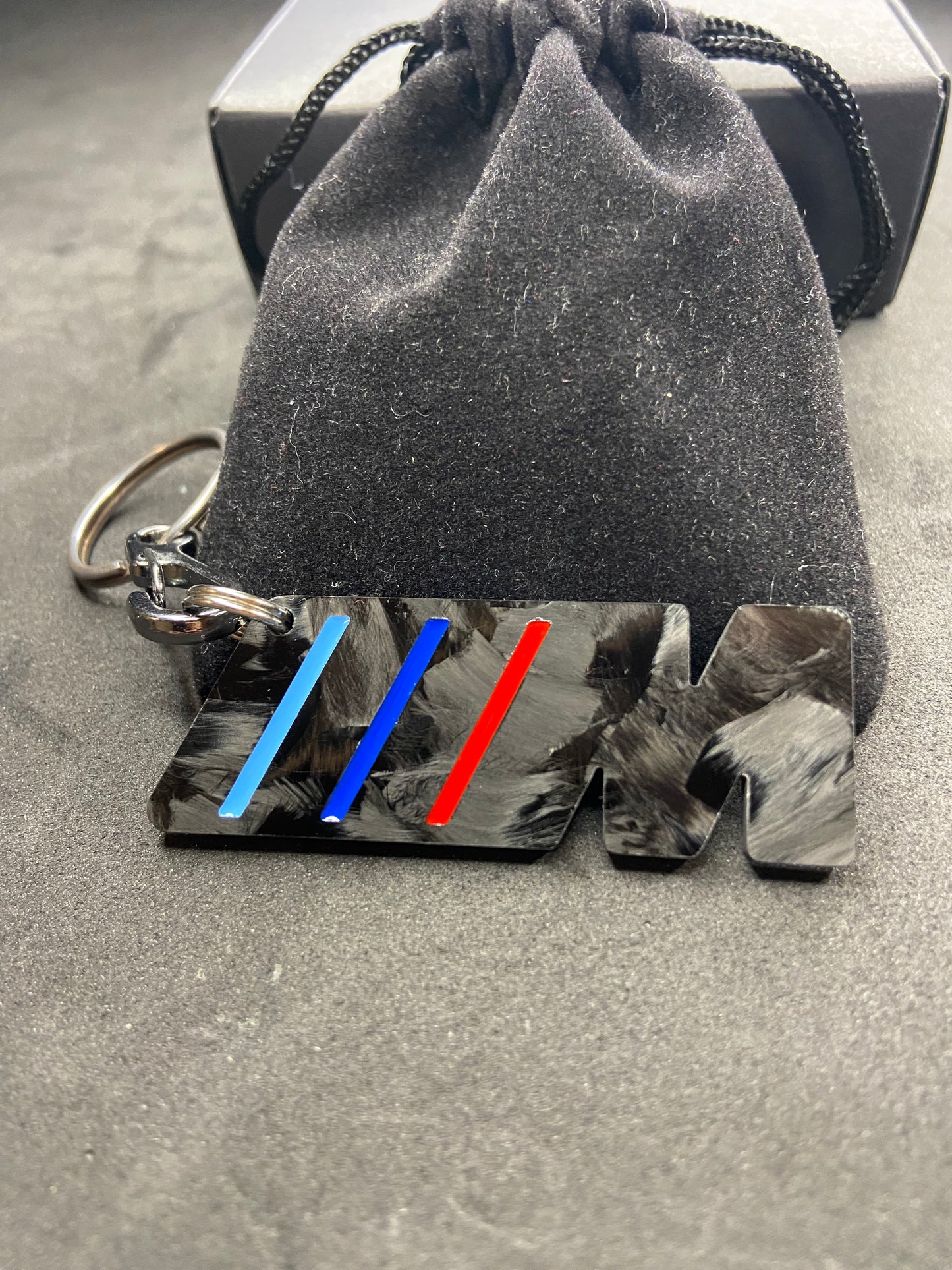 M keychain