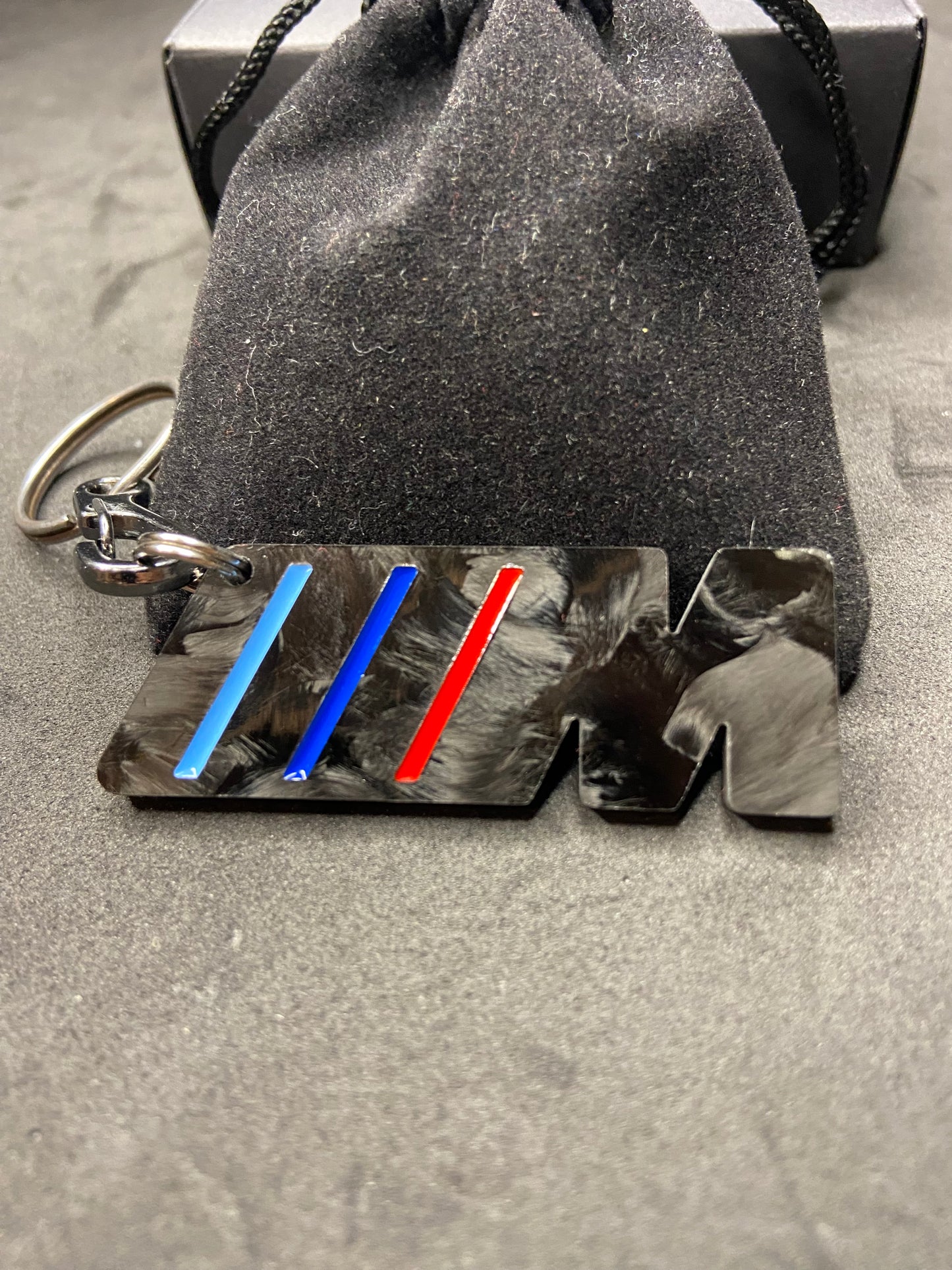 M keychain